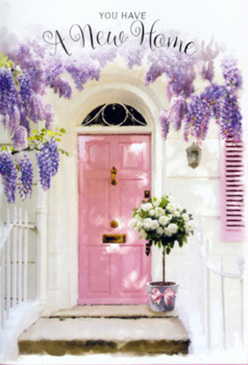 This photograph captures the kind of inviting entrance you might notice while strolling past the Victorian terraces of Forest Hill on your way towards Honor Oak Park. At the centre stands a painted pink front door, its pastel hue soft and uplifting, setting a hopeful tone. Draped over the doorframe and spilling down from above is a cascade of wisteria, the blooms arranged in loose, natural clusters that sway visually like a floral waterfall. The blossoms are tinted in shades of lavender, lilac, and muted mauve, their small petals giving the impression of a delicate, fragrant veil. Surrounding the doorway, the walls have been whitewashed, their light, matte finish reflecting the soft daylight and enhancing the pastel palette. To one side, a blush-coloured shutter, slightly weathered, adds charm and balance to the composition. On the doorstep, a grey tin bucket sits confidently, acting as an understated vase for a generous arrangement of white and creamy roses. The roses are full and rounded, their velvety petals opening outwards with a sense of luxury and calm, while stems of fresh green foliage peek between them, adding texture and a hint of garden freshness. A pale pink ribbon is tied around the bucket, its satin bow trailing gently over the stone step and mirroring the soft tones of the door. The overall atmosphere is serene yet quietly joyful-a still moment full of meaning, as if a Forest Hill florist has just delivered a housewarming bouquet to celebrate new beginnings. The image speaks of optimism, comfort, and the simple happiness of arriving at a new front door that already feels like home.