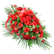 A richly detailed red casket spray is shown against a bright white background, its one-sided, elongated profile flowing gently from a full, rounded head to a more slender tip, echoing the quiet grace of a farewell in Forest Hill. The central focus is a cluster of deep red roses, their velvety petals tightly wrapped in some buds while others unfold into generous, open blooms, each one a small, spiralling testament to love. Surrounding these, numerous red carnations fill the arrangement, their finely ruffled petals layered upon one another to create lush volume and a sense of softness beneath the more defined rose shapes. Scattered through the red blooms are several red gerbera daisies, their open, saucer-like faces and darker centres providing a lively visual accent and a modern contrast. Tiny white filler flowers, such as baby's breath or miniature chrysanthemums, are delicately tucked among the larger flowers, offering flecks of brightness that break up the intensity of the reds and echo the clean background. The entire display is supported by an abundance of greenery: long, dark green palm fronds fan out from the base and sides, giving the spray its length and emphasizing its elegant line, while dense, glossy leaves-likely salal or ruscus-form a rich, supportive bed beneath the blooms. Fine, fern-like fronds peek through here and there, lending additional texture and lightness. Near the top centre, a wide red satin ribbon is tied into a prominent bow, its smooth, shiny loops and decorative tails weaving naturally through the flowers, unifying the design like a tender final embrace. The arrangement conveys profound respect and heartfelt remembrance, a classic funeral tribute well suited to services across Forest Hill, from small chapel ceremonies to larger gatherings nearby.
